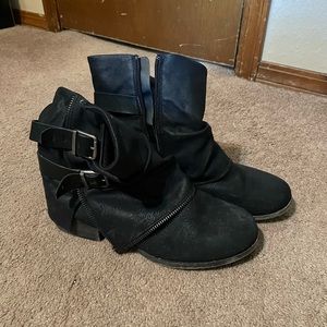 Black zip up boots by SO